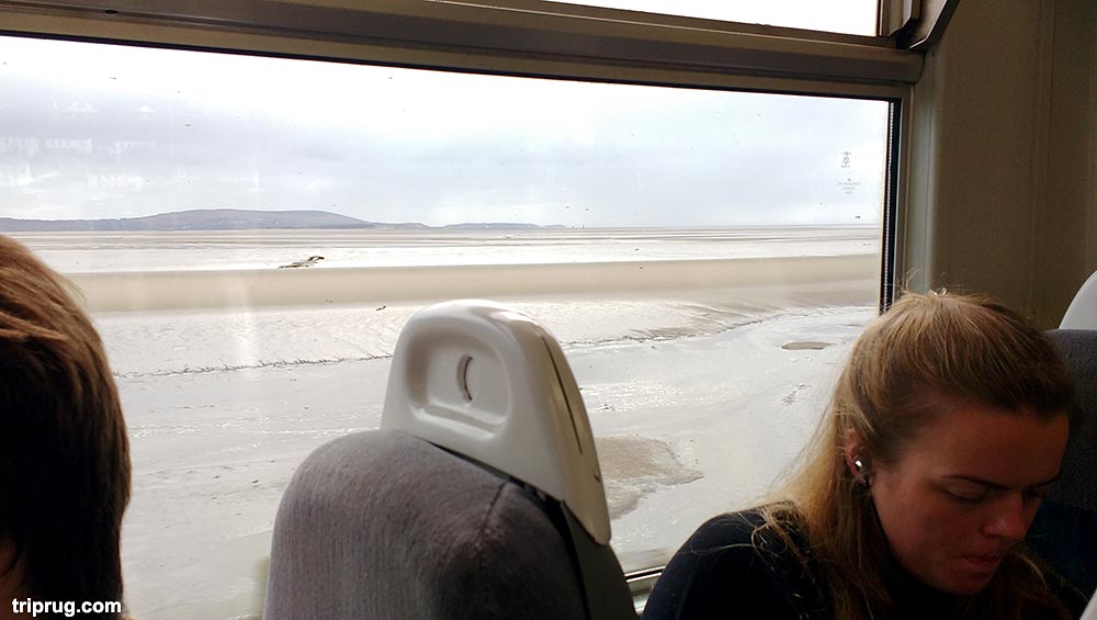 Pembrokeshire Coastal Path and beach viewed from the train